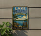 A vintage-style sign for Lake Waramaug State Park in Connecticut, featuring a scenic landscape with a lake, mountains, and pine trees.