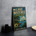 A vintage-style sign for Lake Wateree State Park in South Carolina, featuring a scenic illustration of a lake, trees, and a sailboat.