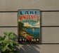 A vintage-style metal sign for Lake Whitney State Park in Texas, featuring a scenic landscape with a lake, mountains, and a sailboat.