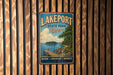 A vintage metal sign for Lakeport State Park in Michigan, featuring a scenic illustration of a lake, dock, and surrounding nature.