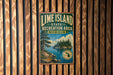 A vintage-style metal sign for the Lime Island State Recreation Area in Michigan, featuring a scenic landscape with a lake, trees, and mountains.