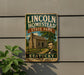 A vintage-style sign for Lincoln Homestead State Park in Kentucky, featuring an illustration of a log cabin and a portrait of Abraham Lincoln.