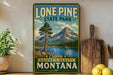 a vintage-style sign for Lone Pine State Park, with a scenic mountain landscape and a lake in the background.