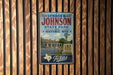 A vintage-style sign for the Lydon B. Johnson State Park and Historic Site, featuring a house and a windmill in a rural setting.