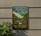 A vintage metal sign for Macedenia Brook State Park in Connecticut, featuring a scenic illustration of a forest and a waterfall.