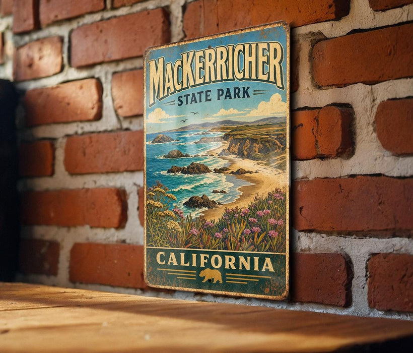 A vintage metal sign for Mackerricher State Park in California, featuring a scenic coastal landscape with rocky cliffs, ocean waves, and wildflowers.