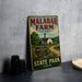 A vintage-style sign for Malabar Farm, featuring a farm scene with a barn and a dirt road, is displayed on a gray wall.