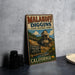 A vintage metal sign for Malakoff Diggin's State Historic Park in California, featuring an illustration of a mining operation and the text "A REMARKABLE GOLD MINING CHUNK OF TIME" and "CALIFORNIA".