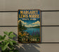 A vintage-style metal sign for Margaret Lewis Norrie State Park in New York, featuring a scenic landscape with pine trees, a lake, and mountains.