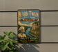 A vintage-style metal sign for Mark Twain State Park in Missouri, featuring a portrait of Mark Twain and a scenic landscape.