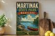 A vintage-style poster of Martinak State Park, Maryland, featuring a scenic image of a lake with a canoe, surrounded by trees and mountains.