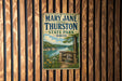A vintage-style metal sign for Mary Jane Thurston State Park in Ohio, featuring a scenic landscape with a river and trees.