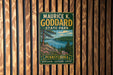 A vintage-style metal sign for Pennsylvania State Park, featuring a scenic landscape with a lake and mountains.