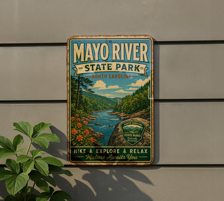 A vintage-style metal sign for Mayo River State Park, featuring a scenic landscape with a river, mountains, and trees.