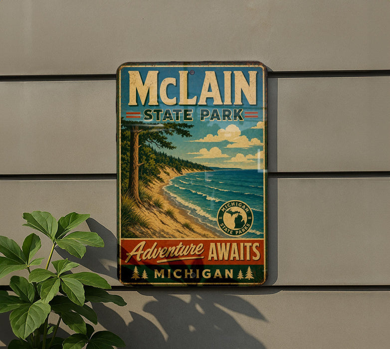 A vintage-style metal sign for Michigan State Park, featuring a scenic landscape with a beach, mountains, and a lake.