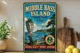 A vintage-style sign for Middle Bass Island State Park, Ohio, featuring a scenic image of the island with a lighthouse and a chair overlooking the water.