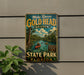 A vintage-style metal sign for Gold Head Branch State Park in Florida, featuring a scenic image of a river with a person kayaking.