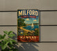 A vintage-style sign for Milford State Park in Kansas, featuring a scenic image of a sailboat on a lake surrounded by trees and mountains.