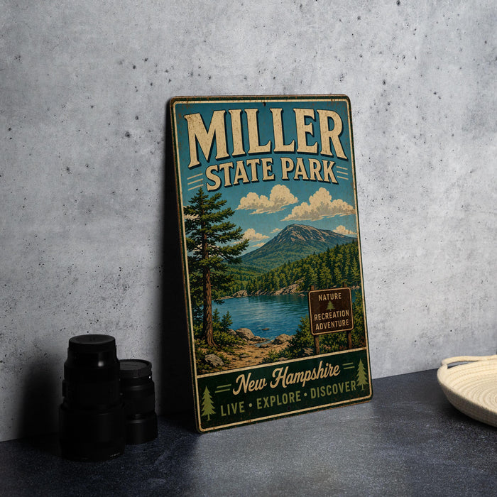 A vintage metal sign for Miller State Park, featuring a scenic landscape with a lake, mountains, and pine trees.