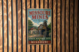 A vintage-style metal sign for the Missouri Mines State Historic Site, featuring an illustration of a mining operation and the text "Missouri Mines" prominently displayed.