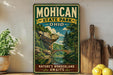 A vintage-style metal sign for Mohican State Park, Ohio, featuring a scenic landscape with a bridge and trees.