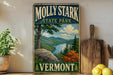 A vintage-style metal sign for Molly Stark State Park in Vermont, featuring a scenic landscape with mountains, trees, and a river.