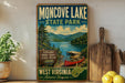a vintage-style sign for Moncove Lake State Park, with a scenic illustration of the lake, mountains, and a red canoe. The sign also includes the text "Explore Hike Boat Fish Relax West Virginia Almost Heaven".