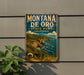 A vintage-style metal sign for Montana de Oro State Park, California, featuring a scenic coastal landscape with cliffs, mountains, and the ocean.