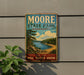 A vintage metal sign for Moore State Park in Massachusetts, featuring a scenic landscape with a lake, mountains, and pine trees.