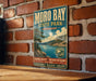 A vintage-style metal sign for Moro Bay State Park in Arkansas, featuring a scenic landscape with a lake and mountains.