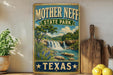 A vintage-style sign for Mother Neff State Park in Texas, featuring a scenic landscape with a waterfall and lush greenery.