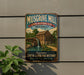 A vintage-style metal sign for Musgrove Mill, a historic site in South Carolina, featuring a wooden mill building and a watermill.