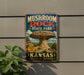 A vintage-style sign for Mushroom Rock State Park in Kansas, featuring a large mushroom formation in the background.