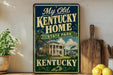 A vintage-style sign for "My Old Kentucky Home State Park" is displayed on a wooden shelf, with a potted plant and a wooden cutting board nearby.