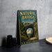 A vintage-style metal sign for Natural Bridge State Park in Massachusetts, featuring a scenic image of the arch and the surrounding landscape.
