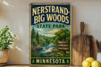 A vintage-style metal sign fornersound-big woods state park in Minnesota, featuring a scenic landscape with a waterfall and pine trees.