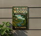 A vintage-style sign for New Glarus Woods State Park in Wisconsin, featuring a scenic landscape with a river, cliffs, and trees.
