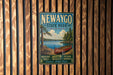 A vintage-style metal sign for Newaygo State Park, Michigan, featuring a scenic image of a canoe on a lake surrounded by pine trees.