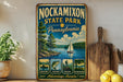 A vintage-style sign for Nockamixon State Park in Pennsylvania, featuring illustrations of various outdoor activities such as boating, fishing, hiking, and picnicking.