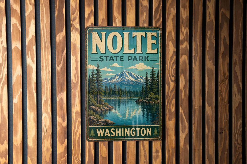 A vintage metal sign for NOLTE State Park in Washington, featuring a scenic mountain landscape with pine trees and a lake.