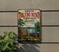 A vintage-style metal sign for North Toledo Bend State Park in Louisiana, featuring a scenic image of a lake, trees, and a boat.
