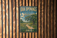 A vintage-style metal sign for Oak Openings Preserve Metropark in Ohio, featuring a scenic landscape with a winding path and trees.