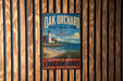 A vintage metal sign for Oak Orchard State Marine Park in New York, featuring a lighthouse and a beach scene.