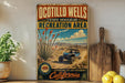 a vintage-style sign for the Ocotillo Wells State Vehicular Recreation Area, with a desert landscape and a blue off-road vehicle in the center.
