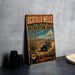 A vintage-style metal sign for the Ocotillo Wells State Vehicular Recreation Area, featuring an illustration of a blue off-road vehicle and desert landscape.