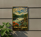A vintage-style metal sign for Ohio State Park, featuring a scenic landscape with a waterfall and mountains, mounted on a wall.
