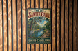A vintage-style sign for Santee Canal State Park in South Carolina, featuring a scenic illustration of the canal surrounded by lush greenery.
