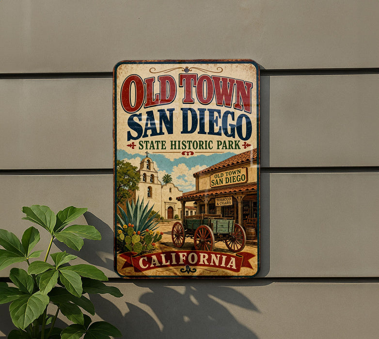 A vintage-style sign for Old Town San Diego, featuring a historical illustration of a town and a church, mounted on a wall.
