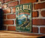 A vintage-style metal sign for Ole Bull State Park in Pennsylvania, featuring a castle and a scenic landscape.