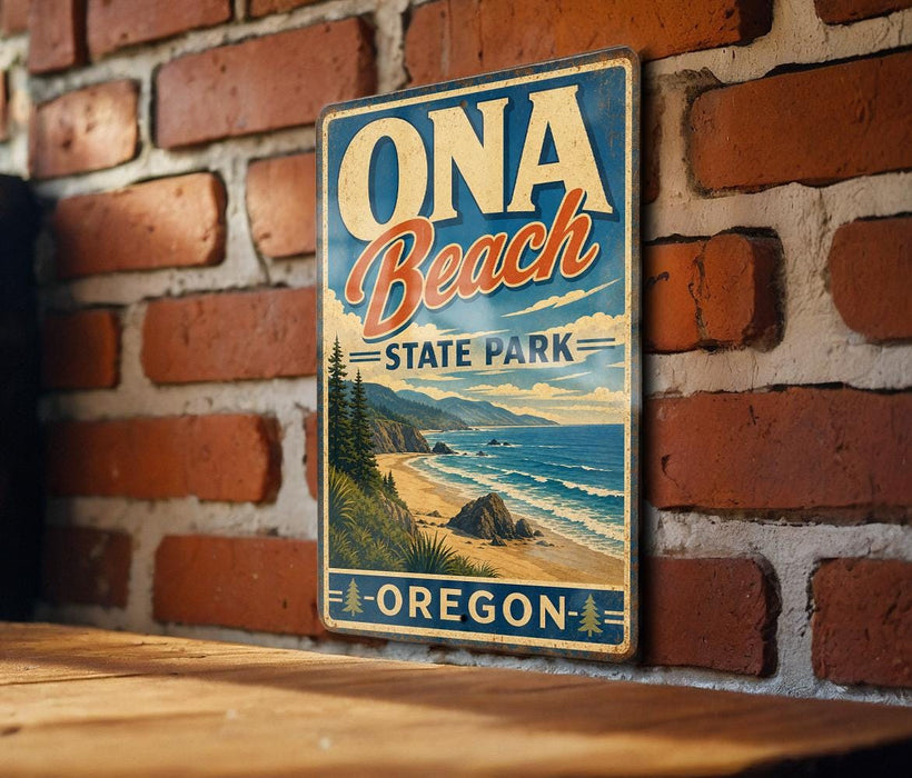A vintage-style metal sign for Oga Beach State Park in Oregon, featuring a scenic beach landscape with mountains in the background.